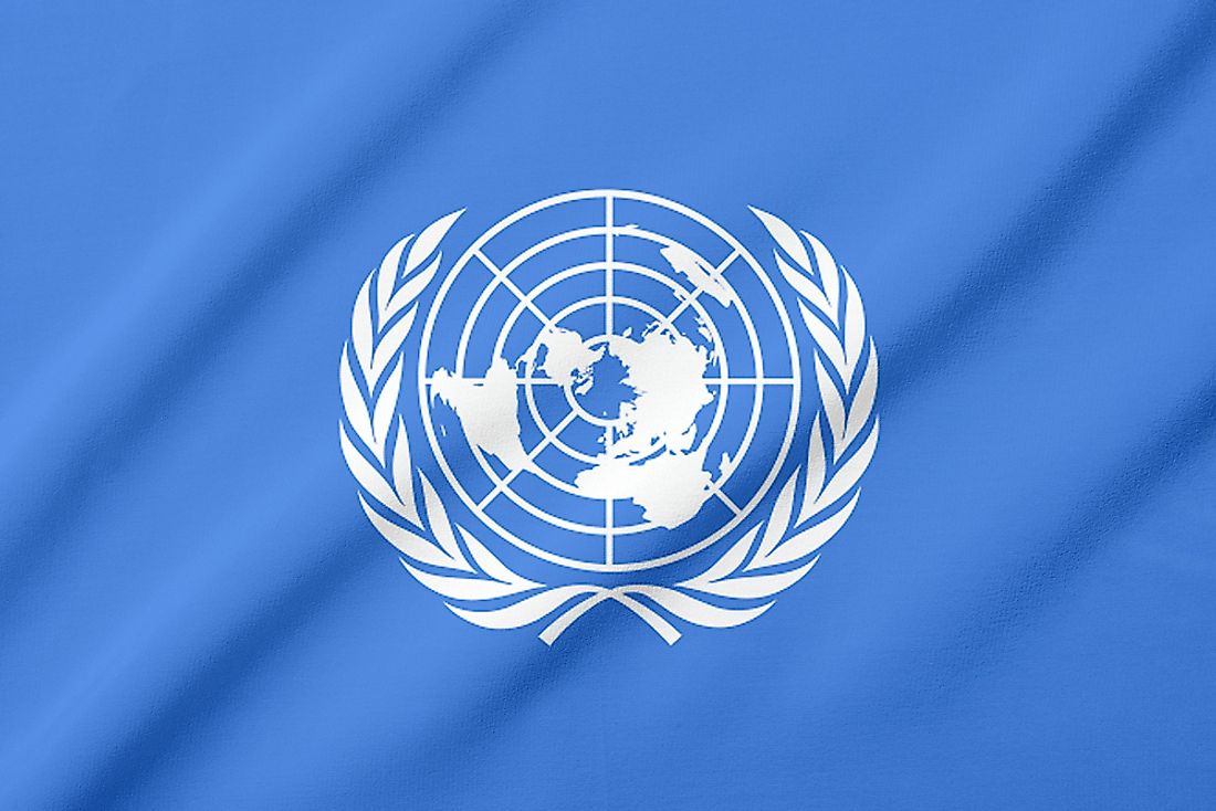 The olive branch wreath represents peace, one of the primary goals of the United Nations.