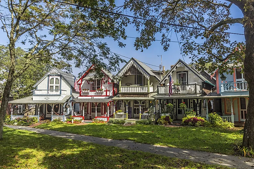 Carpenter Gothic cottages with Victorian style, gingerbread trim on Lake Avenue, Oak Bluffs, Martha's Vineyard, Massachusetts. Editorial credit: travel view / Shutterstock.com