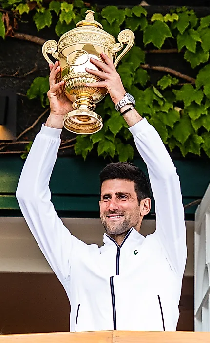 Novak Djokovic, a seven-time champion. In Wikipedia. https://en.wikipedia.org/wiki/List_of_Wimbledon_gentlemen%27s_singles_champions By Peter Menzel, edited by Petar Milošević - Novak Djokovic, CC BY-SA 2.0, https://commons.wikimedia.org/w/index.php?curid=100283716