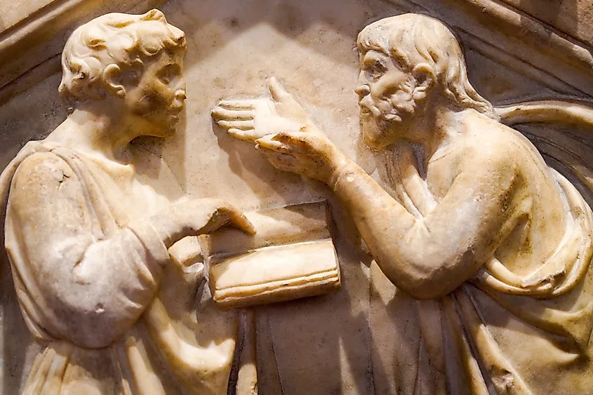 Low relief sculpture depicting Plato and Aristotle arguing by Andrea Pisano (14th Century) adorning the external wall of Florence Cathedral.