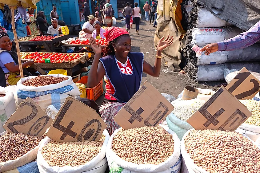 A woman selling peanuts at a marketplace in Vilankulo, Mozambique