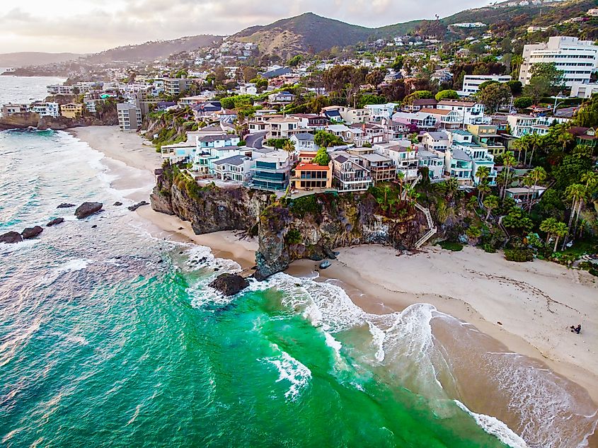 Aerial view of luxury buildings along the coast of Laguna Beach, California.